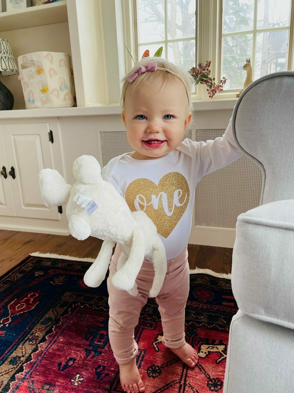 My one-year old daughter in her birthday shirt