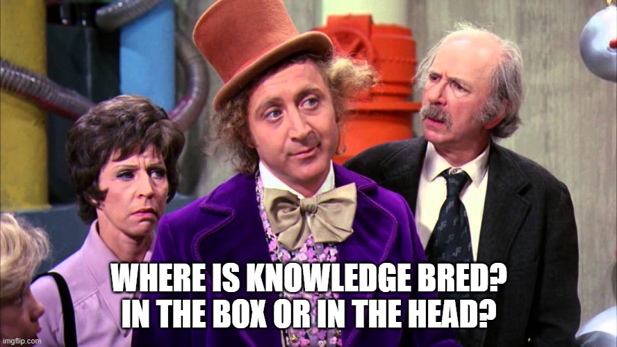 Photo still from Willy Wonka (Warner Bros.,, 1971) with Gene Wilder as Willy Wonka in the center looking away wistfully and Grandpa Joe and Mike TV's mom flanking him with quizzical looks. Underneath is the meme quote: 