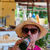 Bhavna drinking a bottle of Hairoun beer at Jack's Beach Bar, Princess Margaret Beach, Bequia