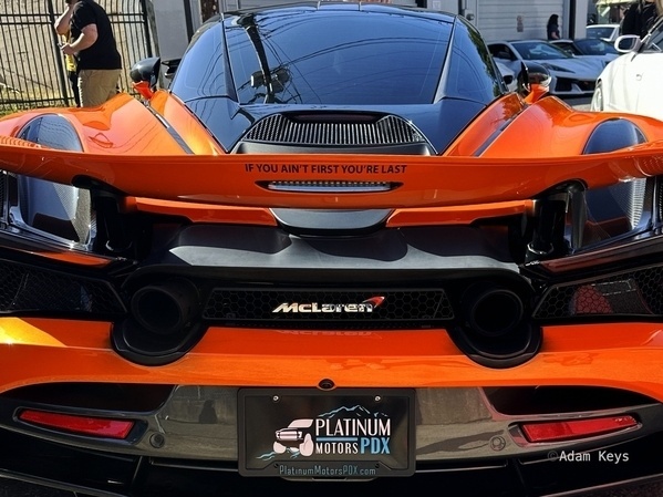 “If you’re not first, you’re last” on the back of a McLaren