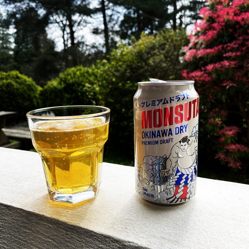 Glass and can of beer